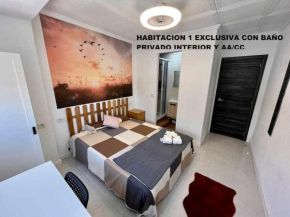 Novelda Centro Habitaciones con baño privado y compartido , cocina y terraza